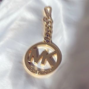 Large and new Michael Kors, purse charm authentic and very Beautiful